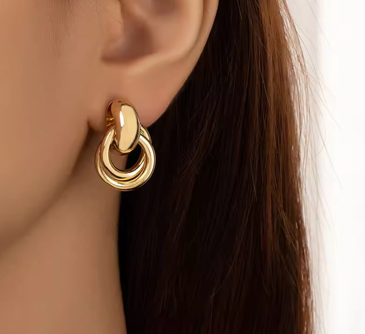 Golden Linked Ring Sculpted Metal Drop Earrings