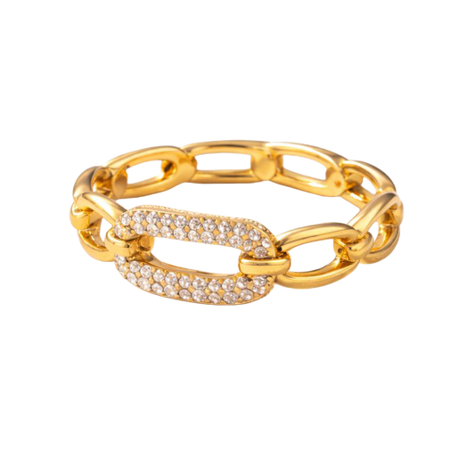 Gold chain bracelet with embedded stones on a white background